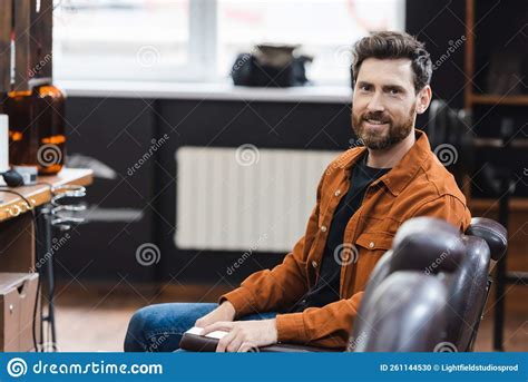 Bearded Brunette Man Sitting In Barbershop Stock Photo Image Of
