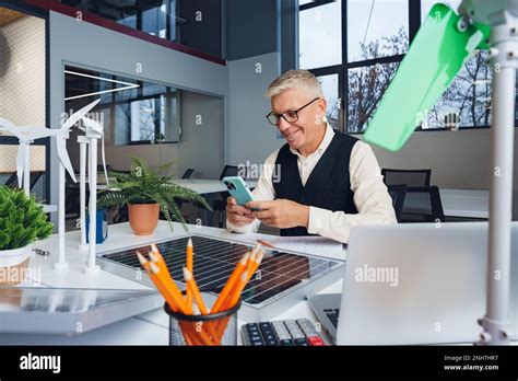 Male Mature Architect Working On An Ecological Construction Project In