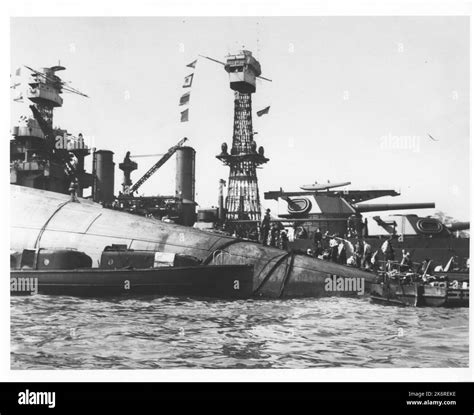 Photograph Of The Capsized Uss Oklahoma And The Uss Maryland After The