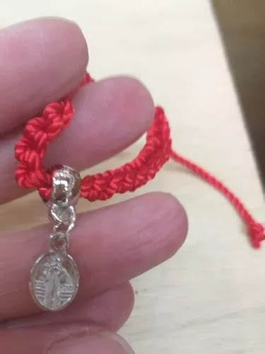 Pulsera Ni O De Proteccion En Hilo Rojo Y Medalla San Benito En Venta