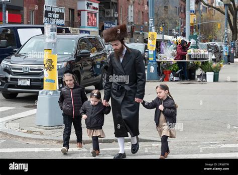 During Passover A Hasidic Jewish Man Wearing The Traditional Shtreimel