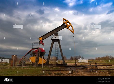 Oil Drilling Derricks At Moutain Oilfield For Fossil Fuels Output And