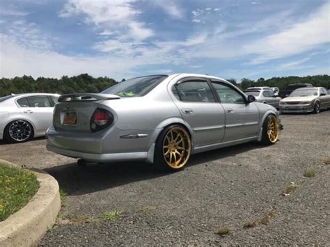 5thgen Nissan Maxima With 19x11 Gold Aodhan DS02 Wheels Installed