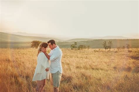 Hd Wallpaper Man And Woman Standing Face To Face In Brown Grass Field