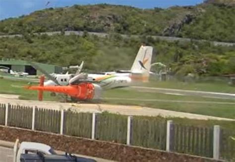 Air Antilles Twin Otter Collides With Parked Helicopter During Landing