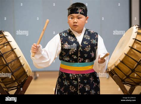 Young traditional Korean drummer preforms rhythmic set on buk drums Stock Photo - Alamy