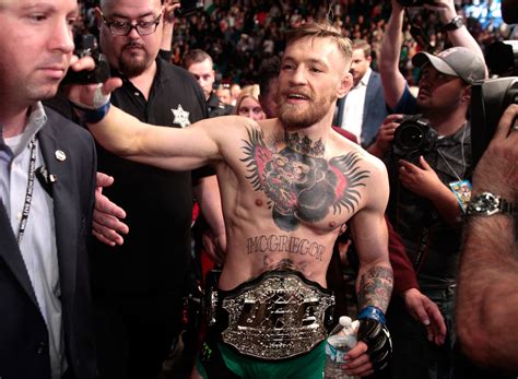 Conor McGregor caps UFC 194 by knocking out Jose Aldo in 13 seconds ...