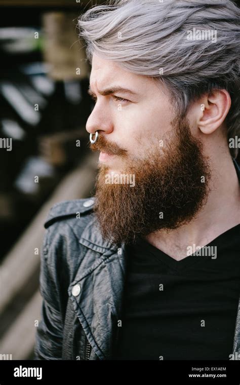 Bearded Hipster With Nose Ring In Leather Jacket Stock Photo Alamy