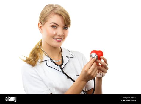 Smiling Woman Doctor Cardiologist In White Apron With Stethoscope