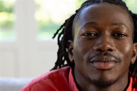 Premium Photo Portrait Of Happy African American Man With Dreadlocks