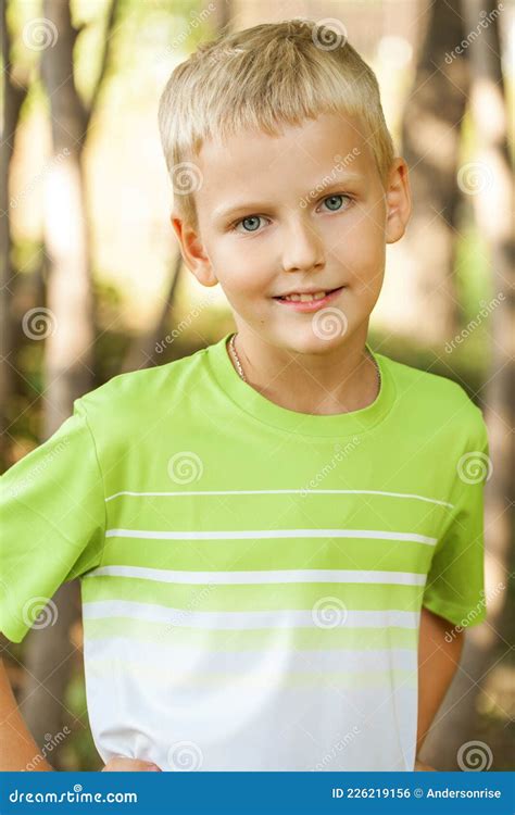 Blonde Little Boy In A Summer Park Stock Photo Image Of Green Nature