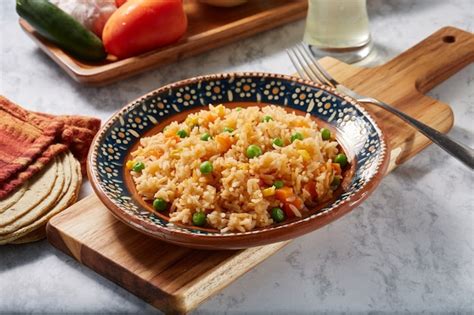 Premium Photo Arroz A La Jardinera Rojo Con Zanahoria Chicharos Y