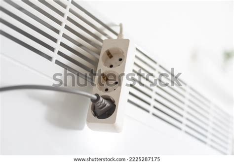 Electric Heater Plug Inserted Into Extension Stock Photo 2225287175