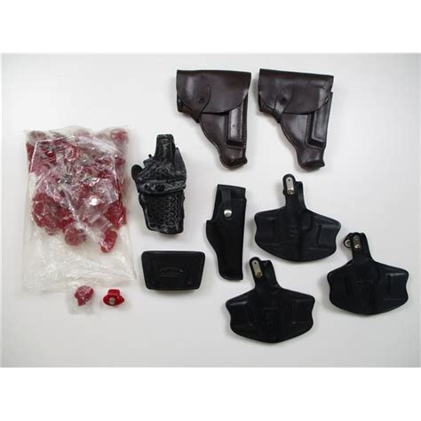 ASSORTED LEATHER SEMI-AUTO PISTOL HOLSTERS ETC - Switzer's Auction & Appraisal Service