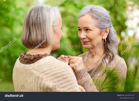 Lesbian Couple Holds Hands Smiles Each Stock Photo 2471357757