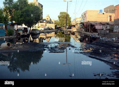 Inundated Road By Overflowing Sewerage Due To Poor Sewerage System