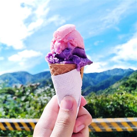 Premium Photo Hand Holding Ice Cream Cone