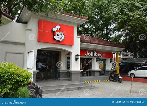 Jollibee Fast Food Restaurant Facade In Manila, Philippines Editorial ...