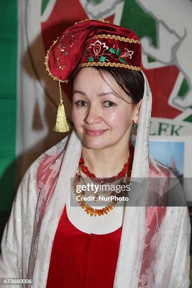 Tartar woman wearing the traditional dress of Tatarstan during Nevruz ...