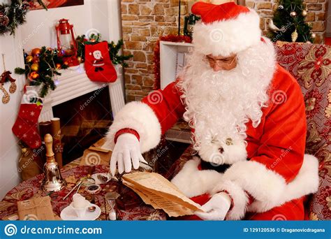 Santa Claus Preparing for Travel and Looking at the World Map Stock Photo - Image of fairy ...