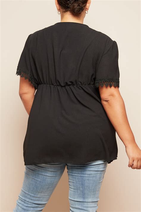 Plus Size Black Wrap Elasticated Waist Crochet Trim Detail Top With Short Sleeves Praslin Clothing