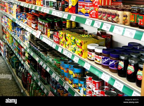 Aisle in convenience shop store with shelves of food and Stock Photo, Royalty Free Image ...