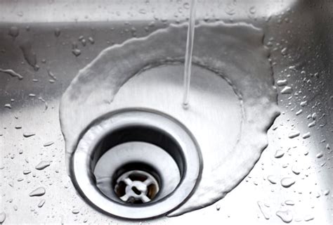 How To Clean Your Kitchen Sink Drain Hero Plumbing