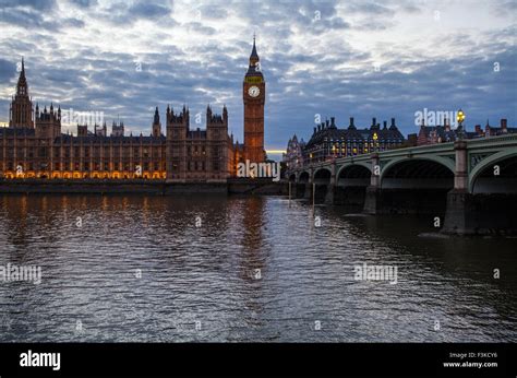 A View Across The River Thames Of The Houses Of Parliament And