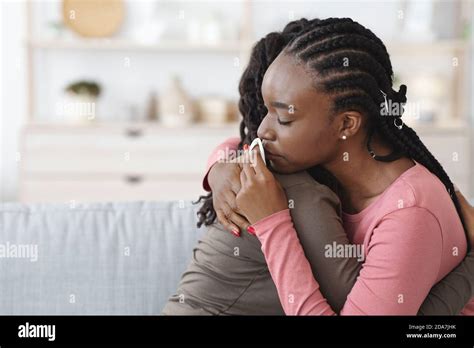 Unrecognizable African American Lady Comforting Her Upset Friend Stock