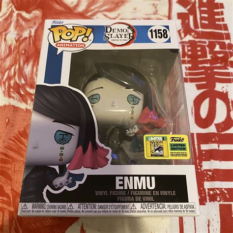 Funko Pop ENMU 1158 DEMON SLAYER SDCC 2022 OFFICIAL STICKER IN HAND