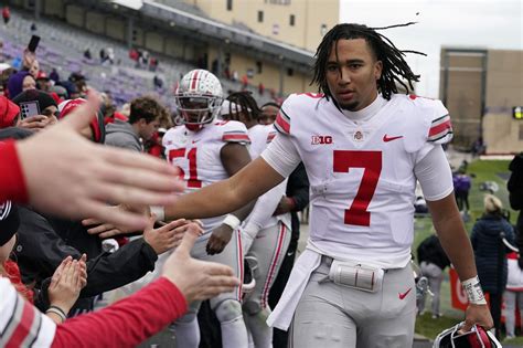 Watch Ohio State Quarterback C J Stroud Conduct The Osu Marching Band