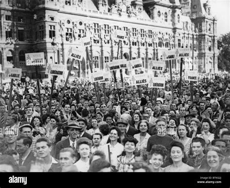 Newly Liberated French Crowd Demonstrate Their Joy At The Hotel De