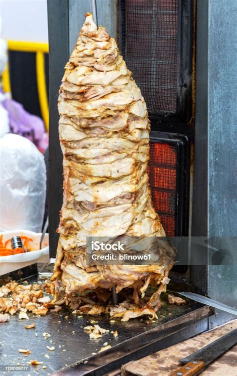 Traditional Fast Food Doner Kebab Meat On A Rotary Grill Stock Photo