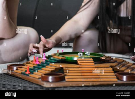 A Close Up Shot Of The Hands Of Two Latina Friends As They Move Their