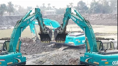 Excavator Stuck In Mud Recovery Excavators Stuck In Mud Two Excavators