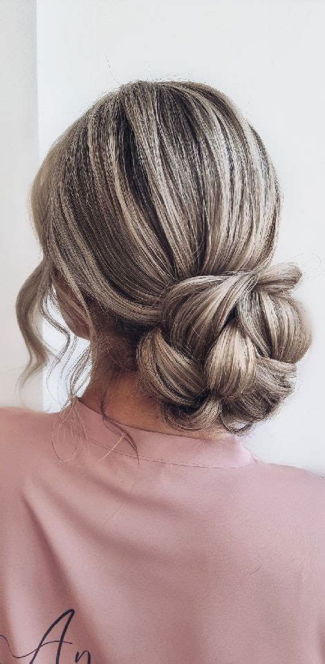 50 Stunning Updos For Any Occasion In 2022 Knot Soft Low Bun