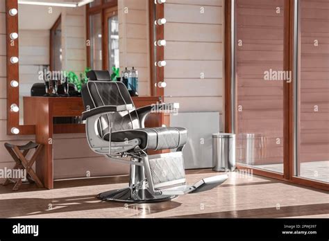 Stylish Hairdresser S Workplace With Professional Armchair And Large