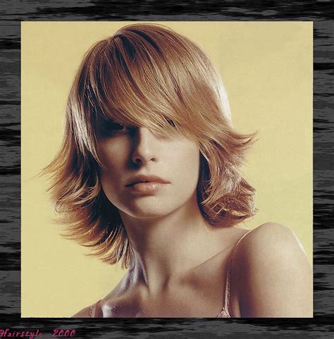 Medium Layered Hair Style With Wispy Side Part Bangs Flip Blonde