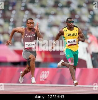 Andre De Grasse running the 100 meters at the 2020 Tokyo Olympics Stock Photo - Alamy