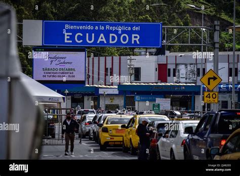 Lines of vehicles are seen crossing the Ecuador - Colombia border at ...