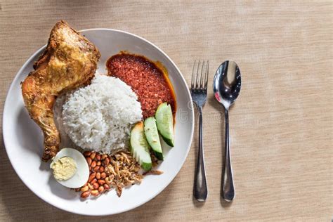 Simple Nasi Lemak With Sambal Fried Chicken Popular In Malaysia Stock