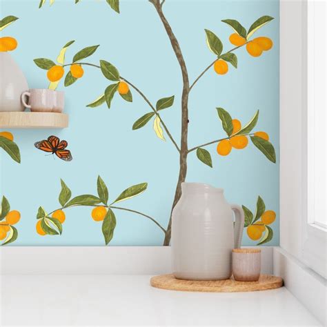 Jenny Kumquat On Light Blue Wallpaper Spoonflower