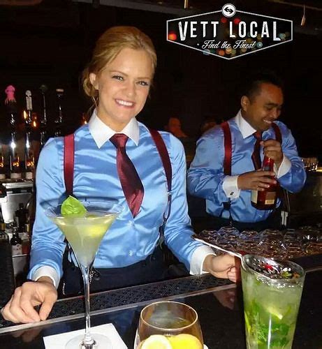 Bartender Dressed In Formal Work Uniform With Red Tie Bartender