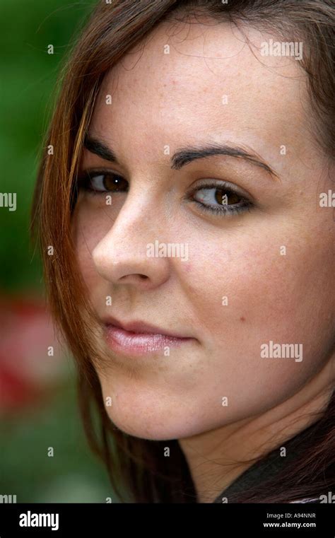 Close Up Of Face Of Young Brown Haired Brown Eyed Irish Woman Early 20s