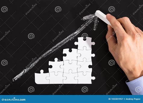 Person Arranging Puzzles On Blackboard Stock Image Image Of Human