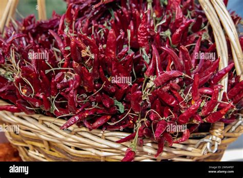 Red Hot Chilly Peppers In Bucket Pattern Texture Background Close Up Landscape A Backdrop Of