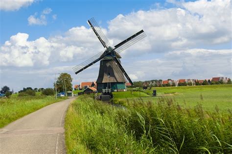 Premium Photo Traditional Dutch Windmill Near Volendam Holland