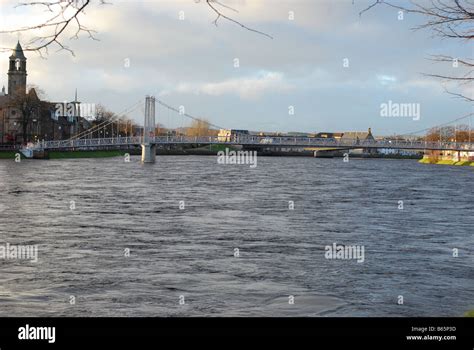 View of River Ness with pedestrian bridge Stock Photo - Alamy