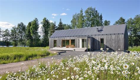 Contemporary Finnish Lake House Is Built With Seven Types Of Timber