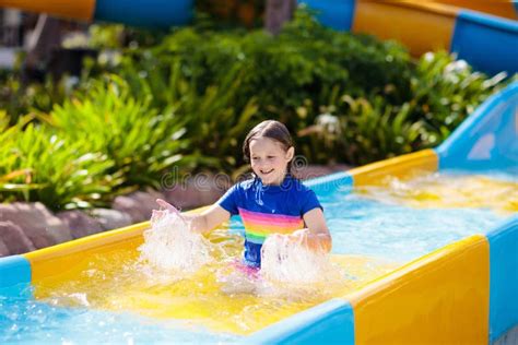 Kids on Water Slide in Aqua Park. Summer Vacation Stock Image - Image ...